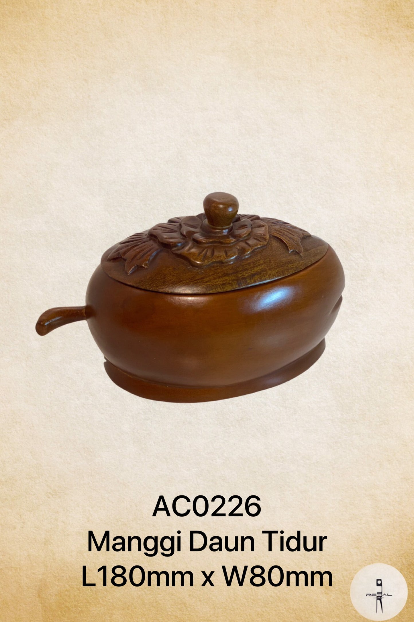 A brown wooden box with a floral pattern on the lid.