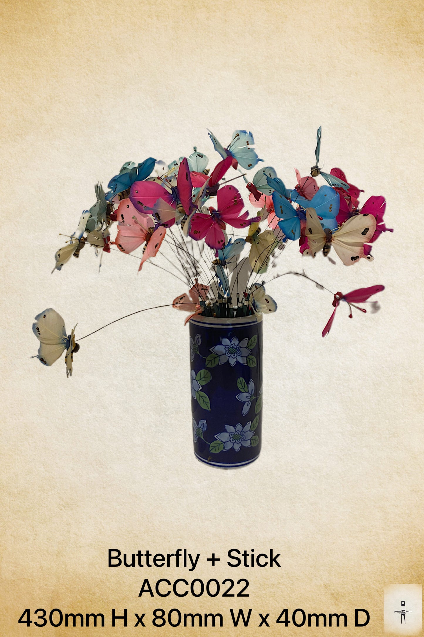 A decorative vase with a floral pattern and butterfly accessories in various colors.