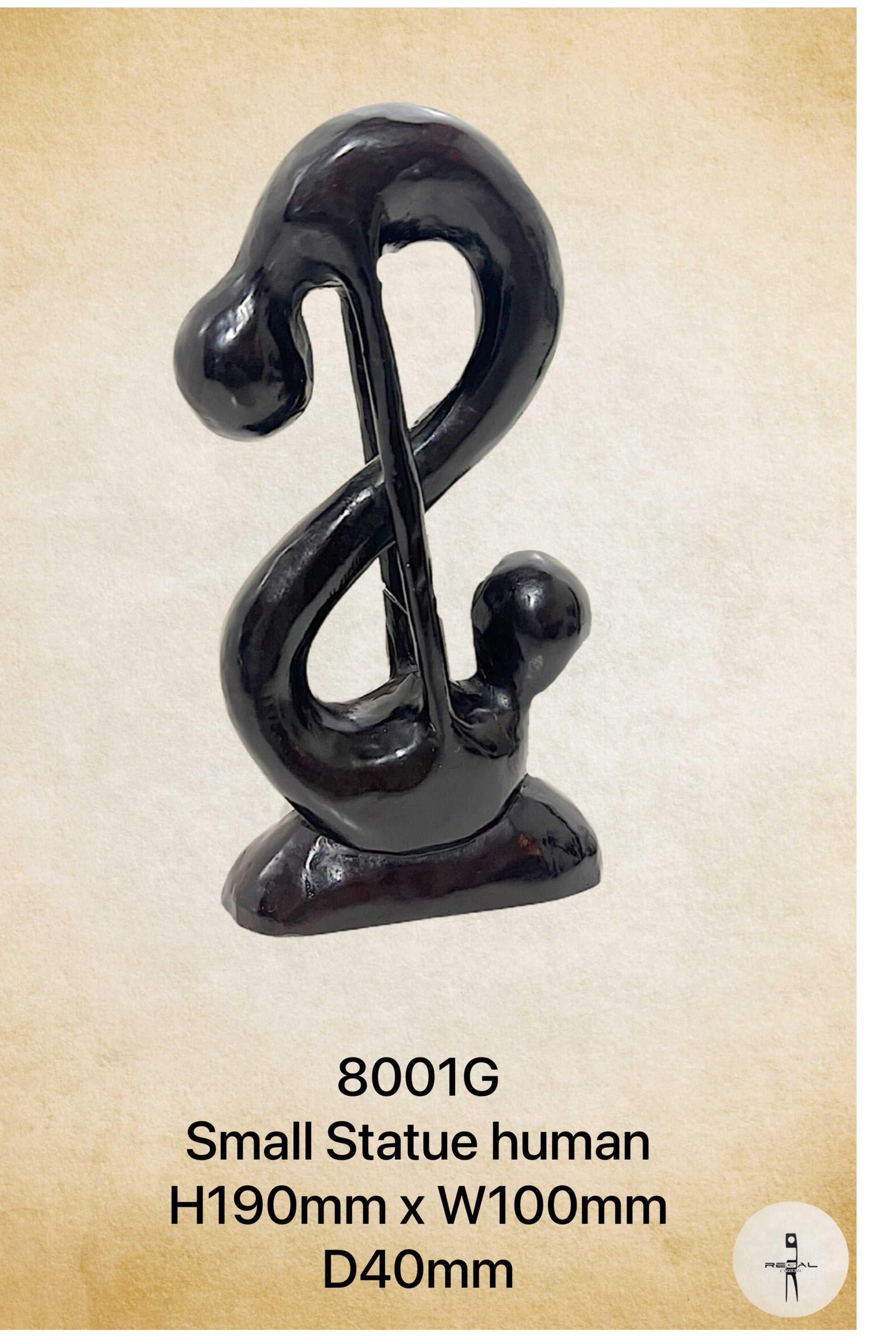 A black sculpture of a stylized human figure, likely made from resin, with a textured finish.