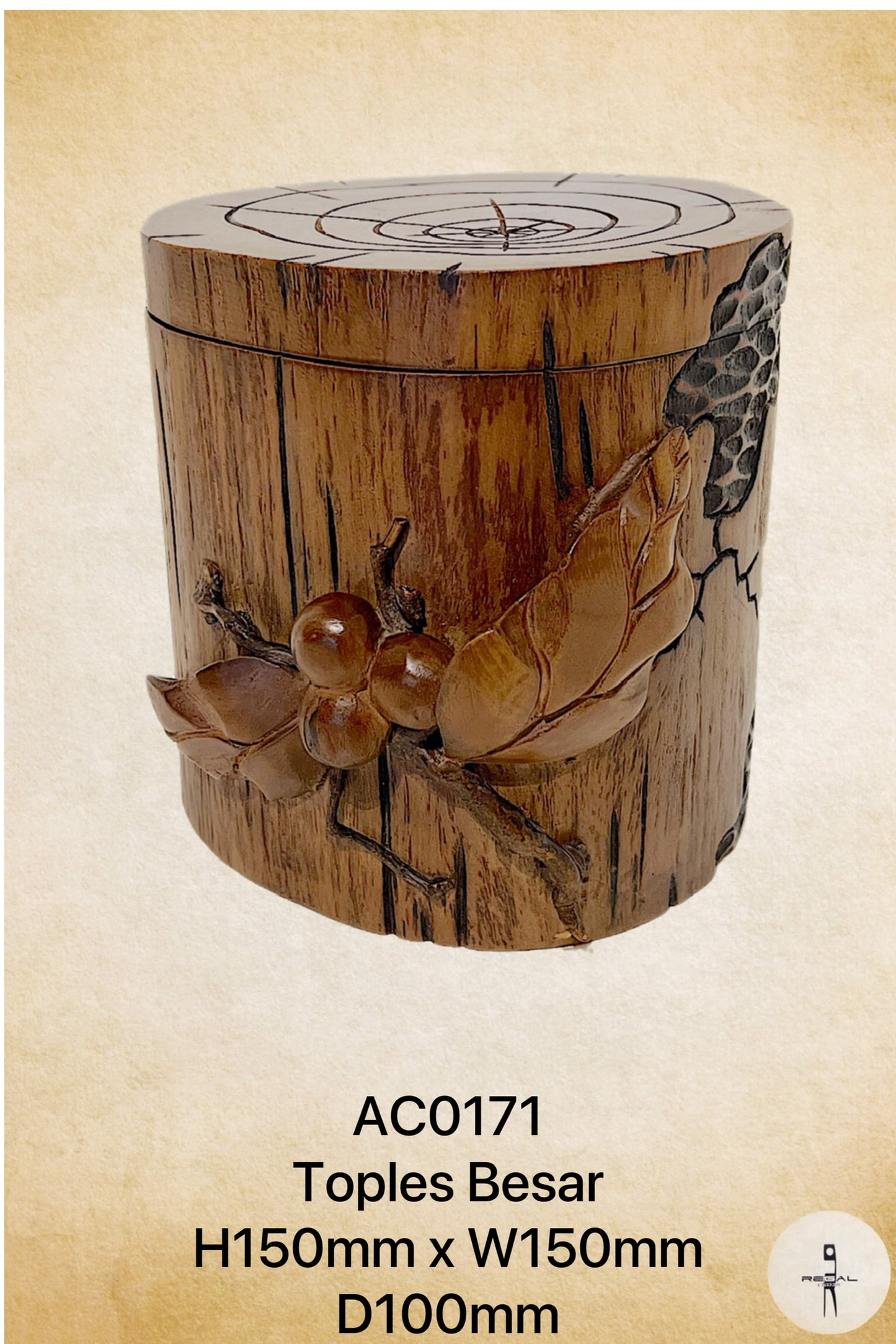 A handcrafted wooden music box with a design resembling a dragonfly and berries on it.