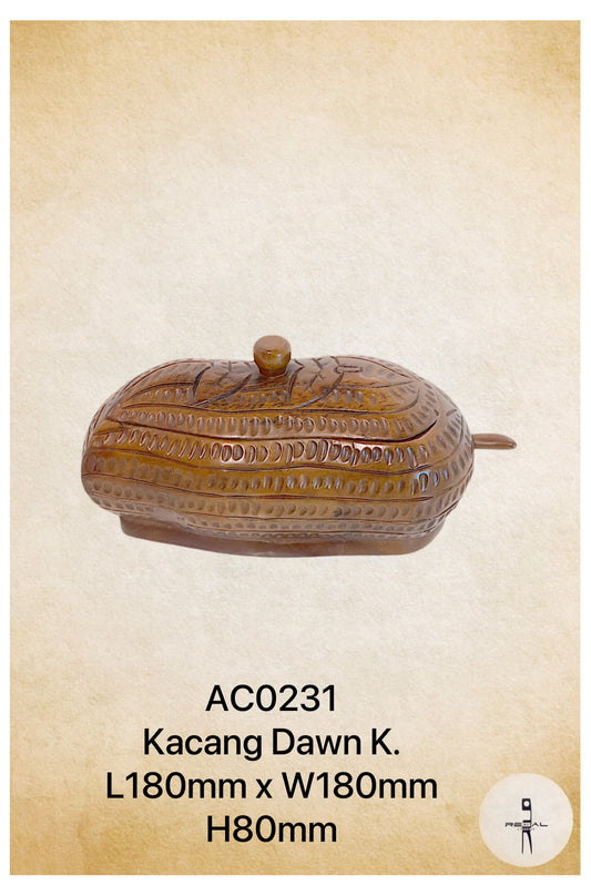 A brown, wooden music box with a lid and a small protruding handle on the top.