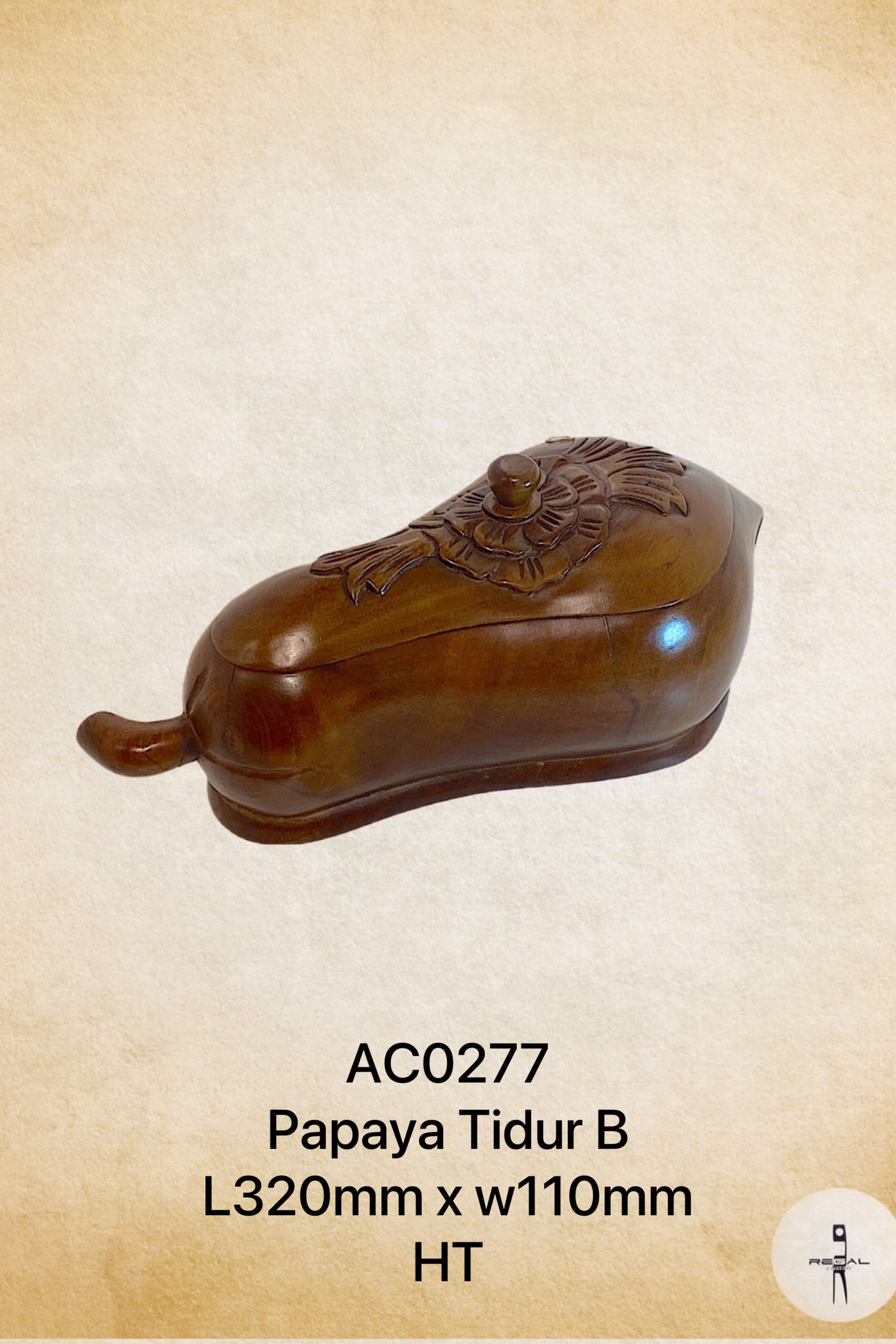 A brown papaya-shaped wooden music box with a lid and a handle