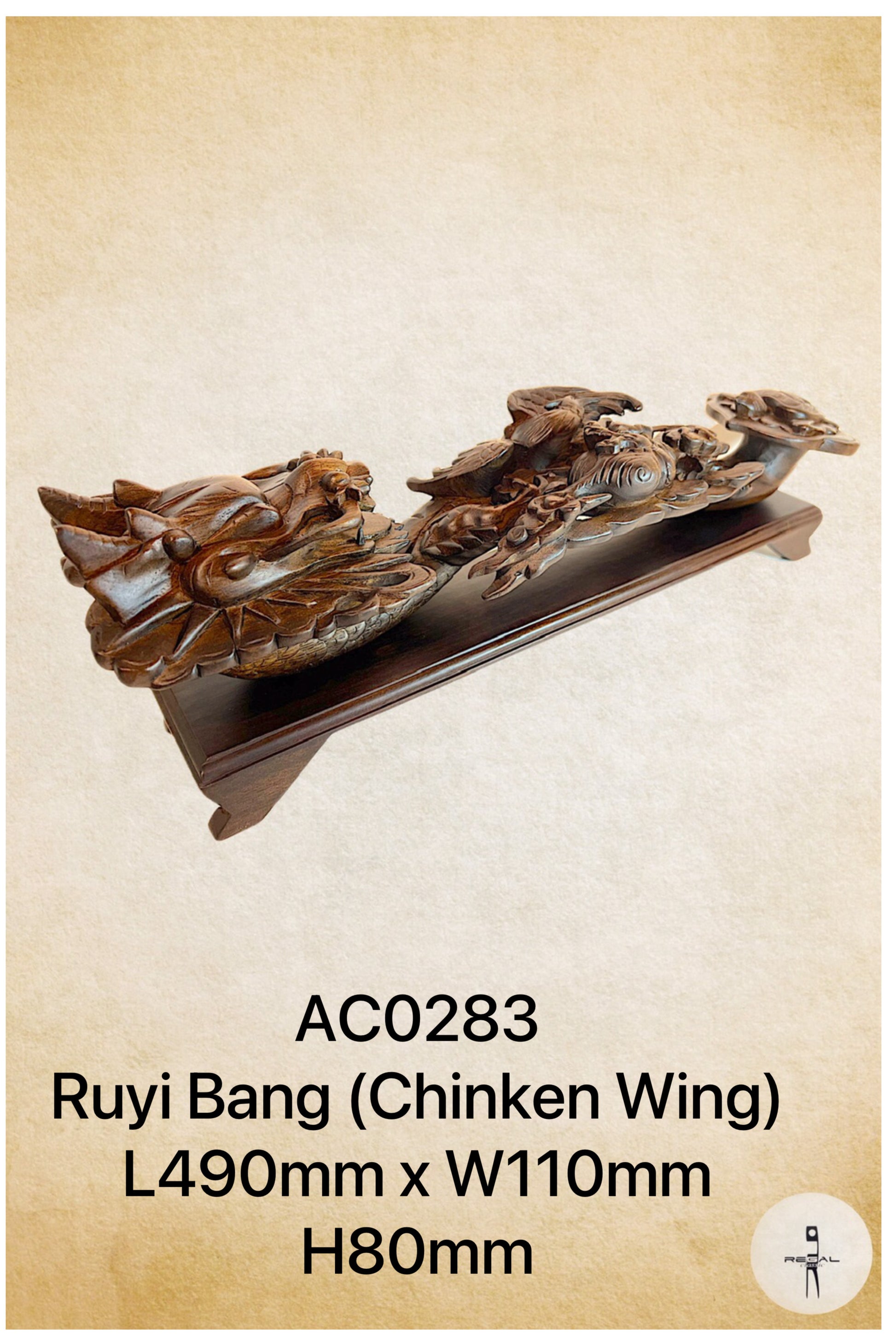 An artwork depicting a dragon in brown color, placed on a wooden stand.