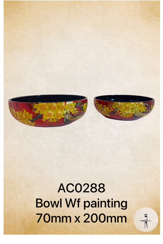 Two decorative bowls with a floral pattern in red, black, and gold colors