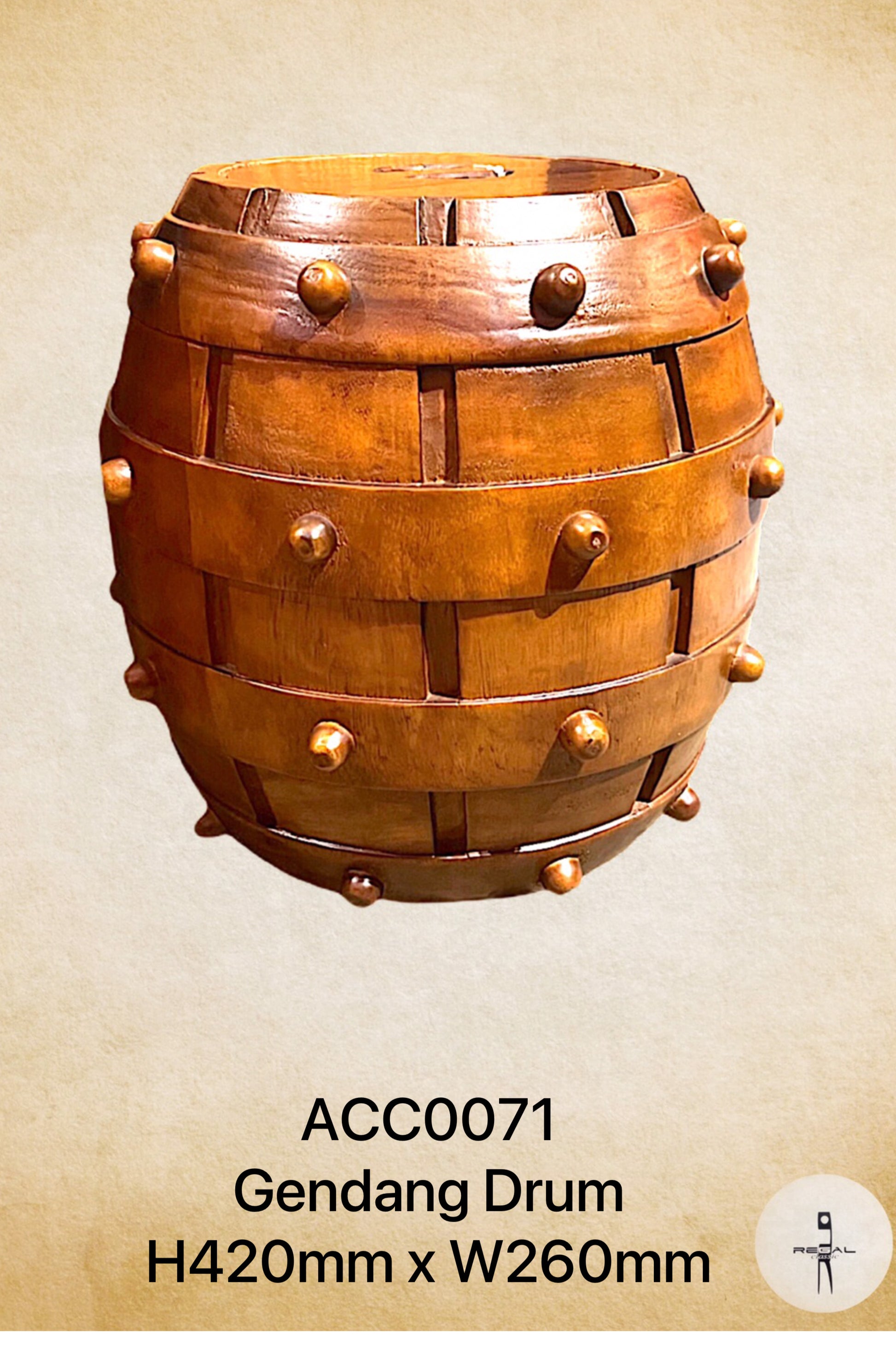 A traditional wooden gendang drum with a series of graduated rods, viewed from the top down.