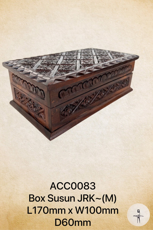 A brown wooden storage box with intricate carvings on the lid.