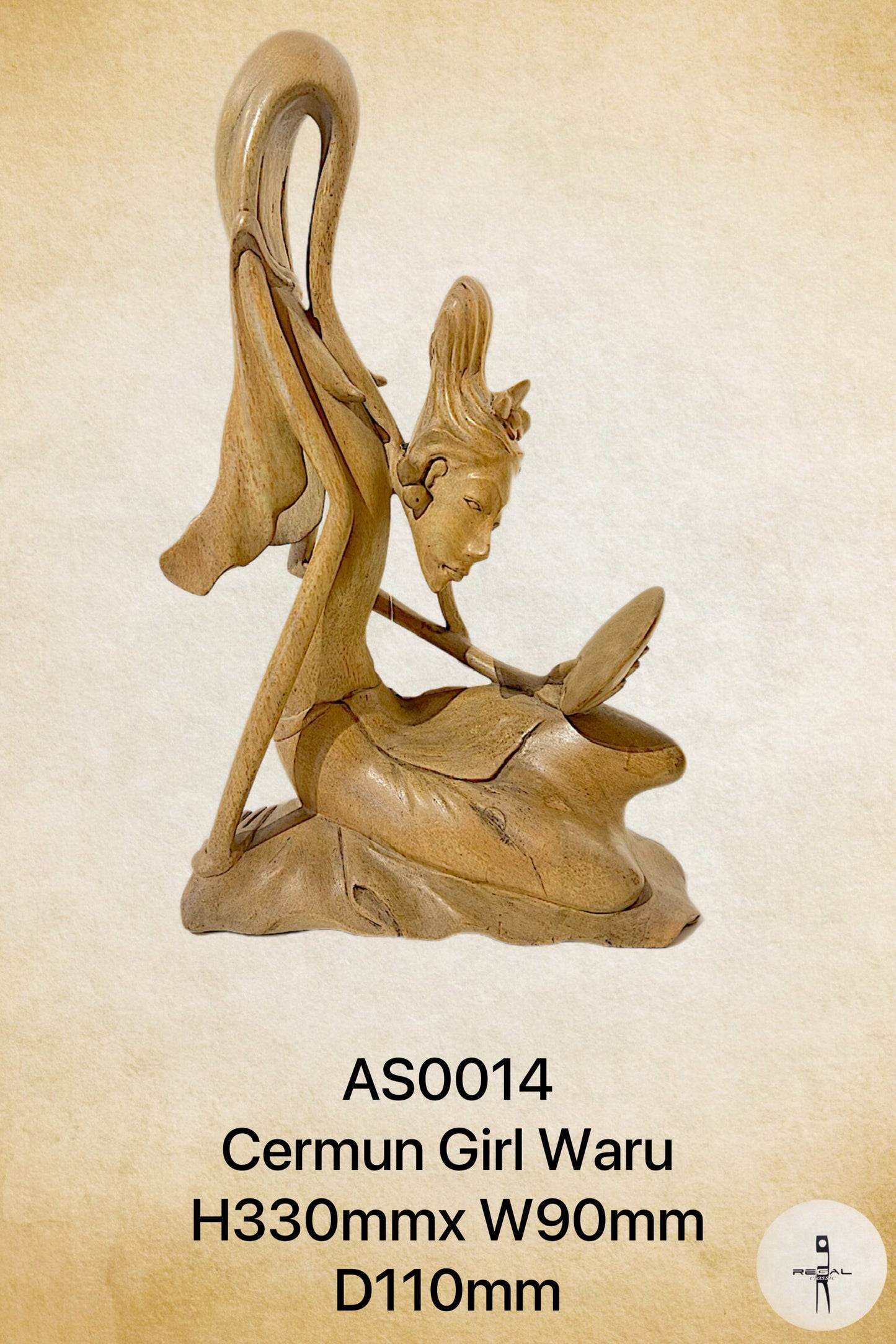 A wooden sculpture of a female figure with flowing hair, seated with a book.