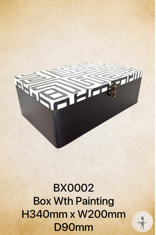 A black and white geometric patterned music box with a lid and a small handle on the side.