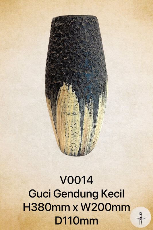 A small, irregularly shaped clay artwork with a dark base color transitioning to a lighter color towards the top, with a textured surface.