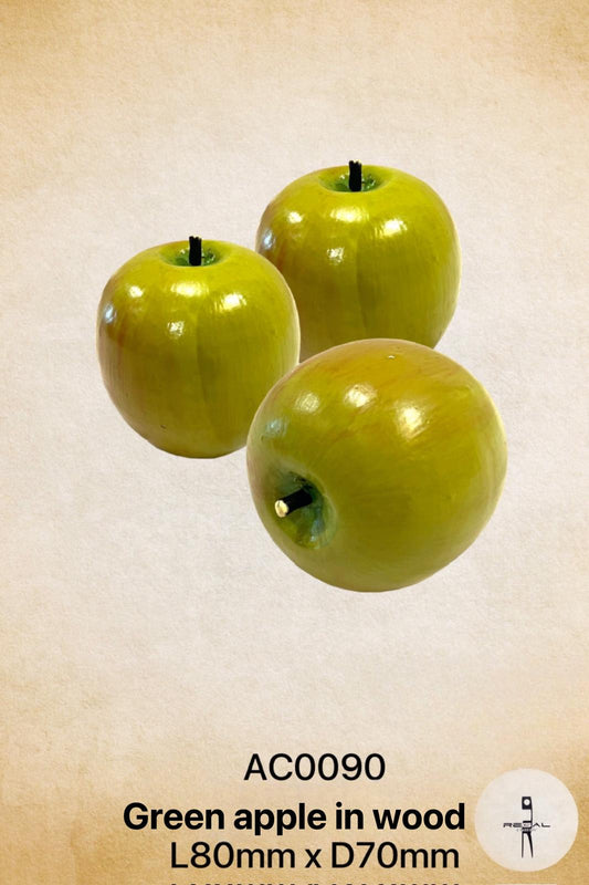 Green apple in wood